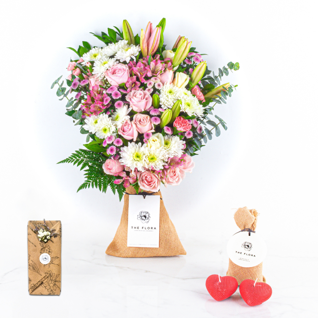 Pastel Affection: Mother's Day Special Bouquet with fragrant heart candles & Twin Chocolates //Delhi