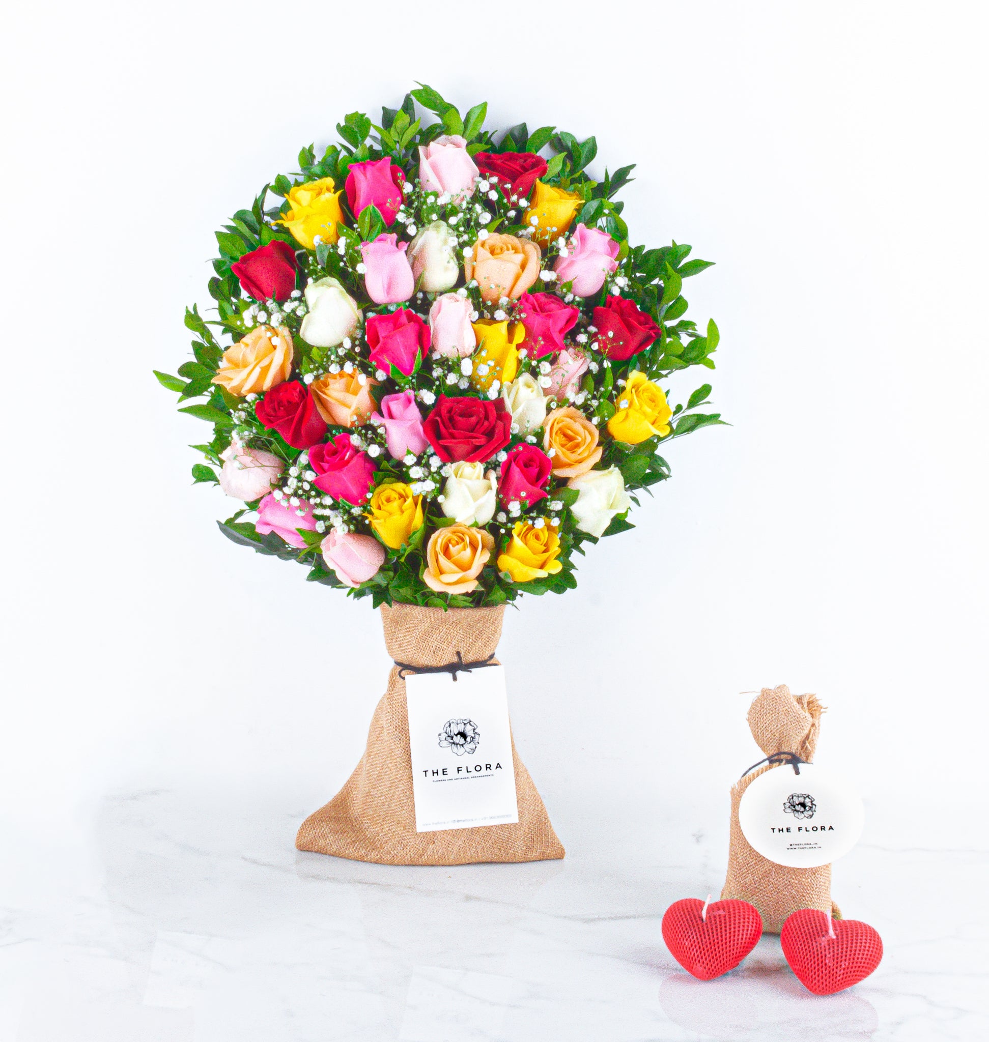 Rosy Embrace: Valentine’s Special Bouquet with fragrant Heart Candles //Delhi