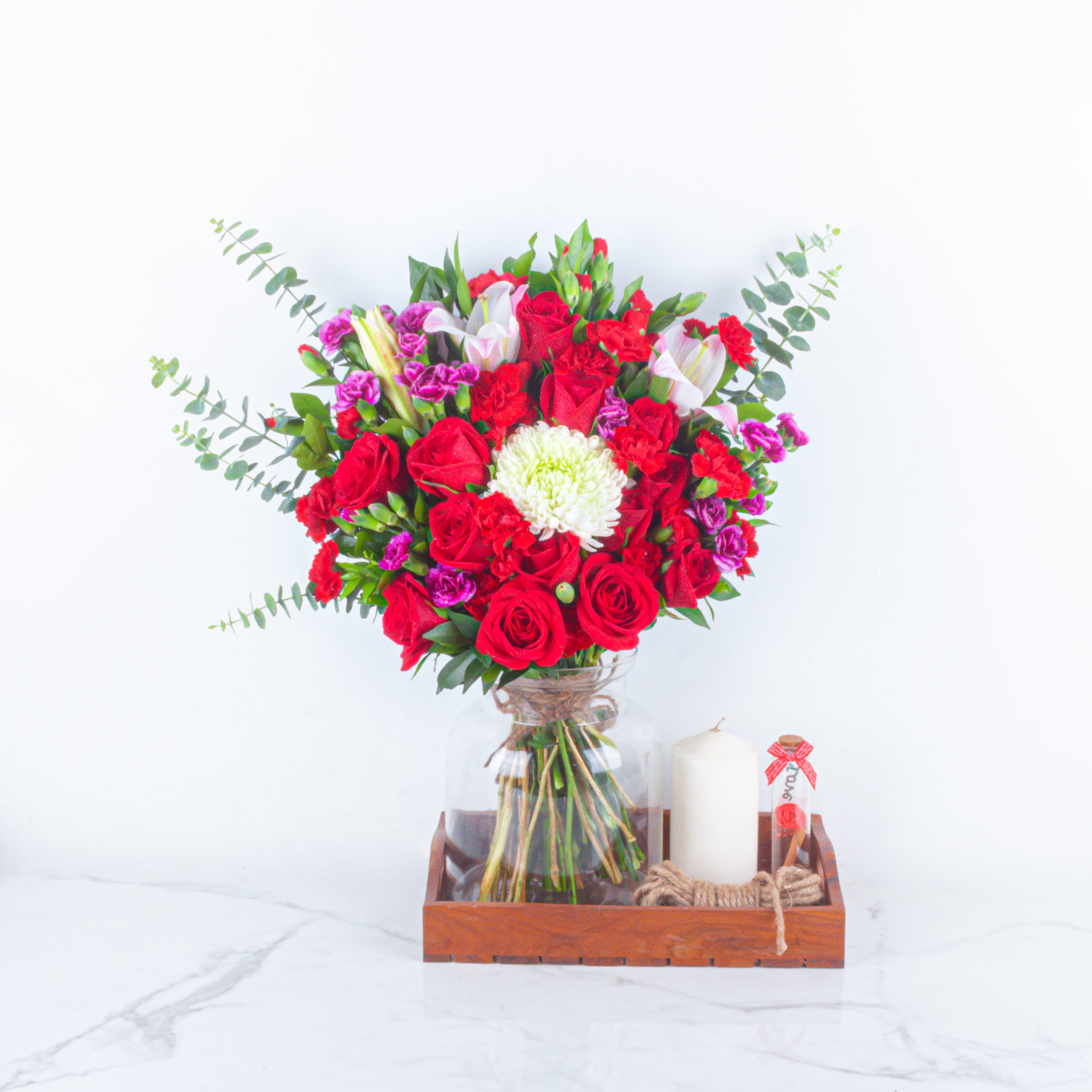 Eternal Amour: Valentine’s Special Bouquet with Scroll Message & Heart Candles