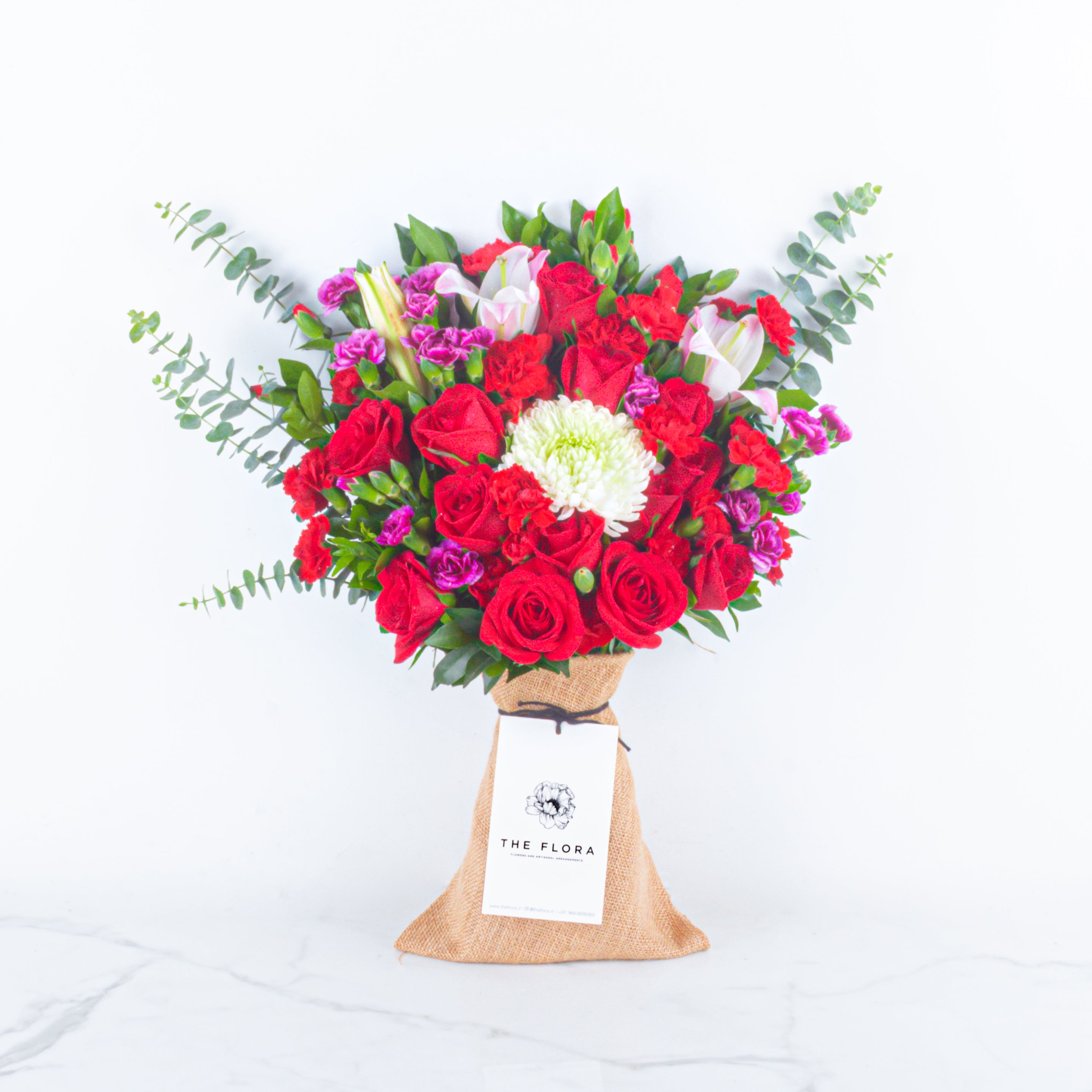 Eternal Amour: Valentine’s Special Bouquet with Scroll Message & Heart Candles