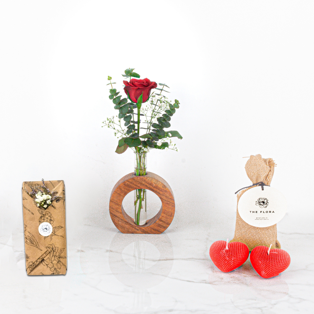 OneLove Wonder: Women's Day Special Rose in a Wooden Stand with fragrant heart candles & Twin Chocolates //Delhi