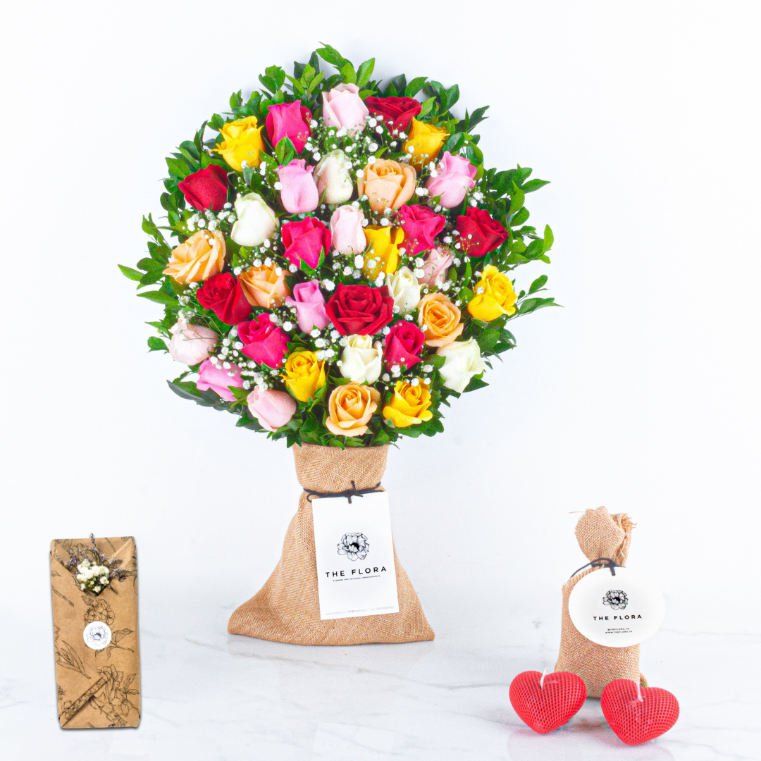 Rosy Embrace: Women's Day Special Bouquet with fragrant heart candles & Twin Chocolates //Delhi